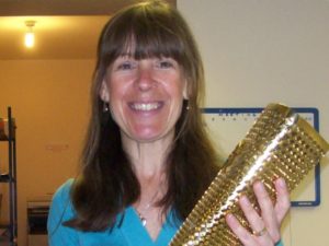 Mrs Lowe with the Olympic torch in 2012