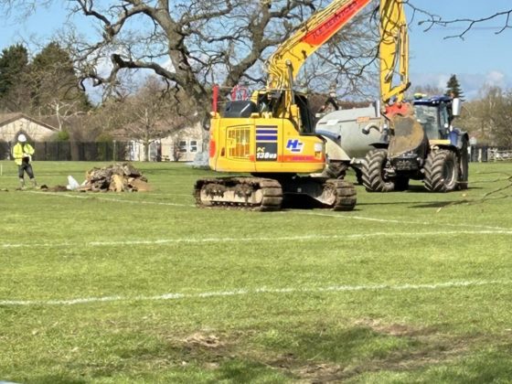 Unplanned contractors' vehicles on the football pitch at the Rec